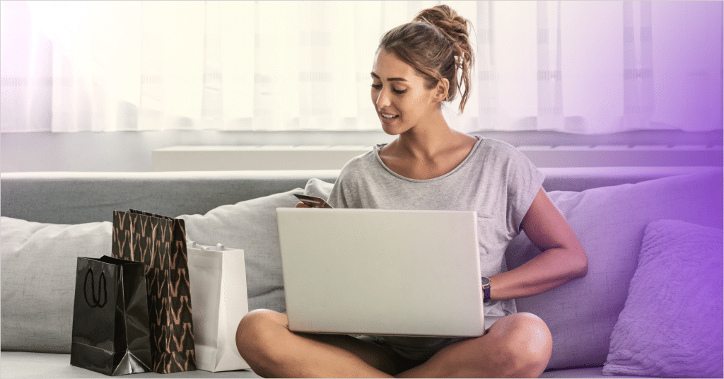 monetizing-E-commerce-traffic-ad-integration - woman sitting with a laptop